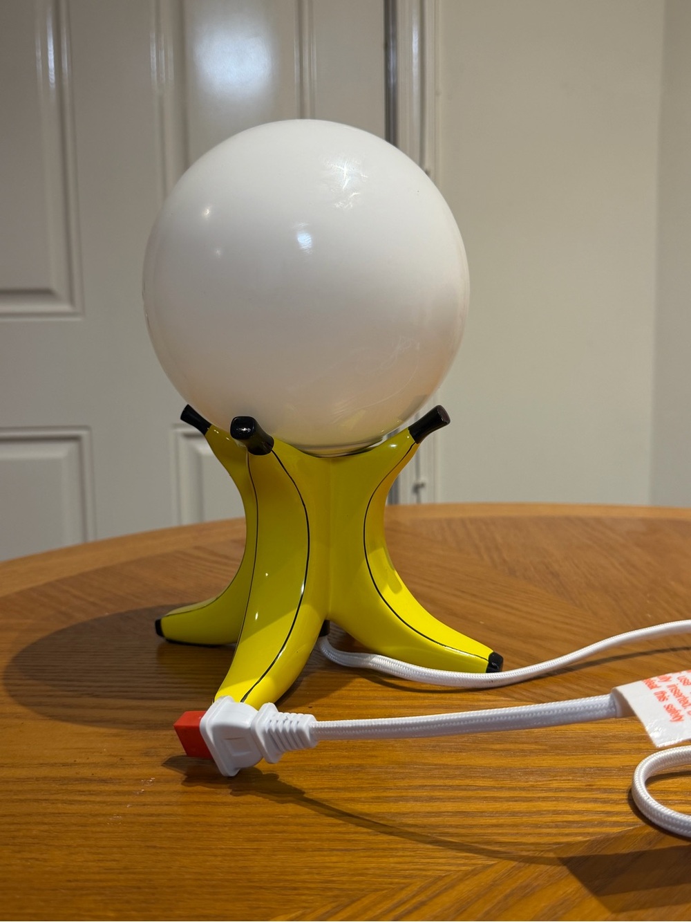 Urban Outfitters Yellow Banana Tripod Lantern with White Globe